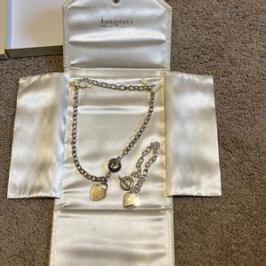 .925 silver necklace and bracelet set.